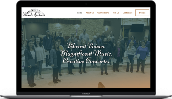 Choral Spectrum's new website on laptop.